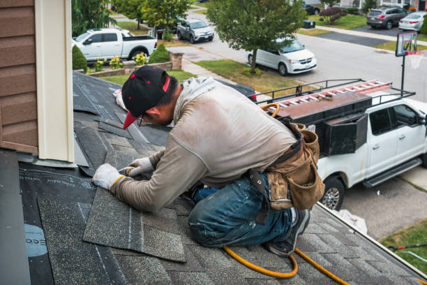 Professional Roofing technician working in Loganville, WI